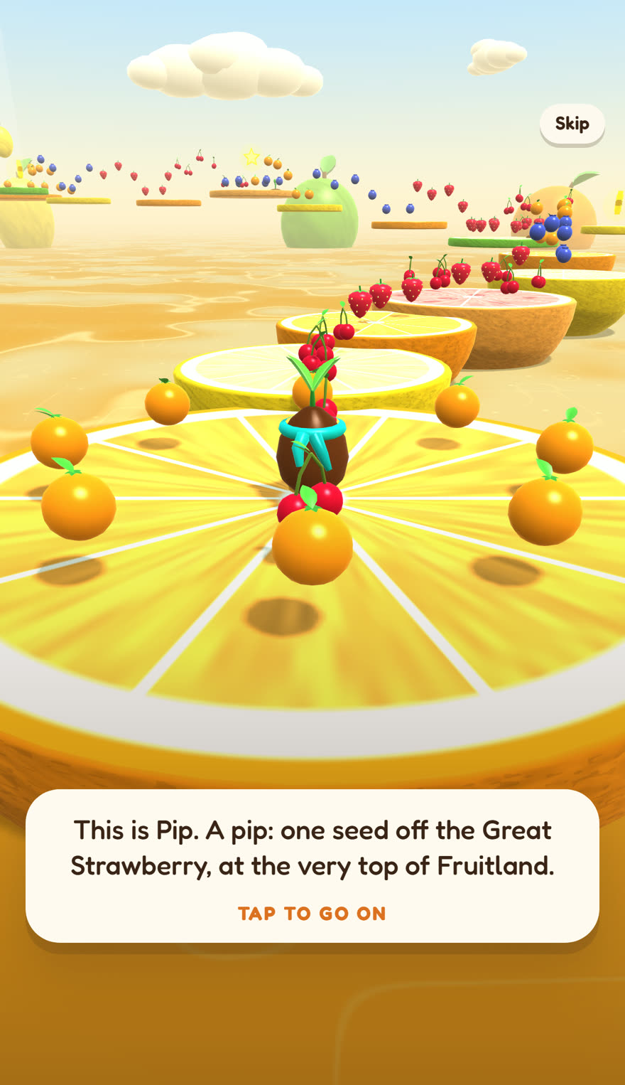 A phone screen in portrait. Pip the seed stands in the middle of a huge orange slice ringed with small oranges, a line of cherries and strawberries leading away over more citrus halves. A card at the bottom reads: This is Pip. A pip: one seed off the Great Strawberry, at the very top of Fruitland. Tap to go on. A Skip button sits top right