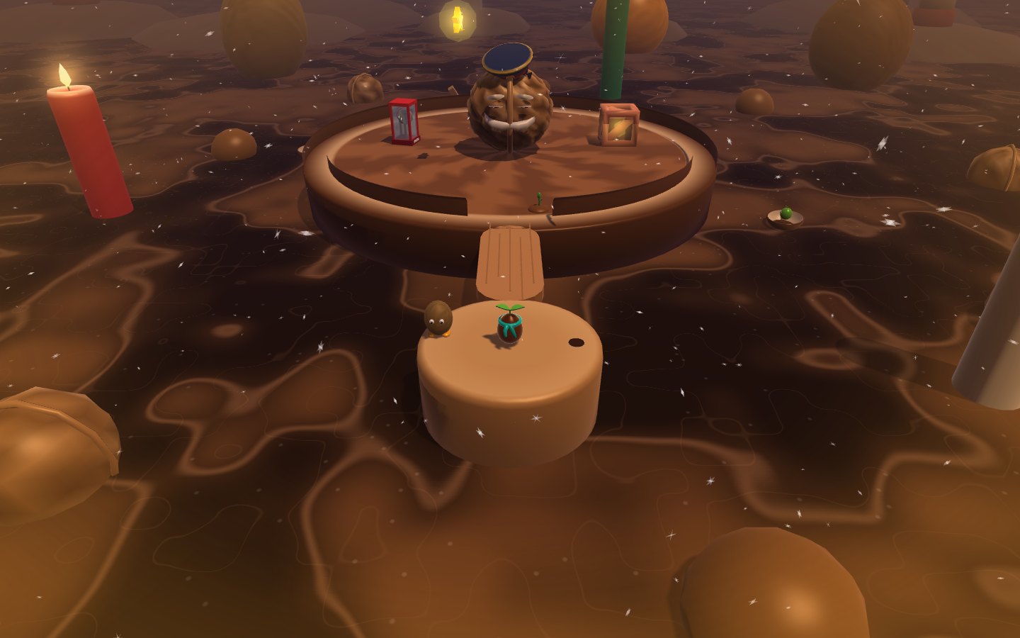 A round arena of chocolate in a sea of melted chocolate, with walnuts and a lit red candle around it. A giant walnut with a moustache, a grin and a blue soldier's cap stands in the middle between a red sentry box and a crate. Pip stands on a chocolate drum at the end of a wafer bridge, next to a small hazelnut. Snowflakes drift