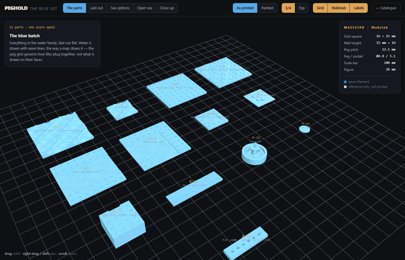The blue batch of PEGHOLD parts laid out in the 3D viewer: baseplates, water tiles, a shore edge, a waterfall block, a fountain and the fit comb